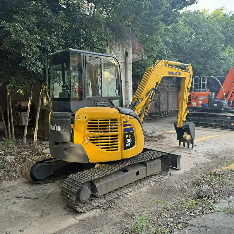 Perspective view of a PC50MR, part of our mini excavator for sale used stock.