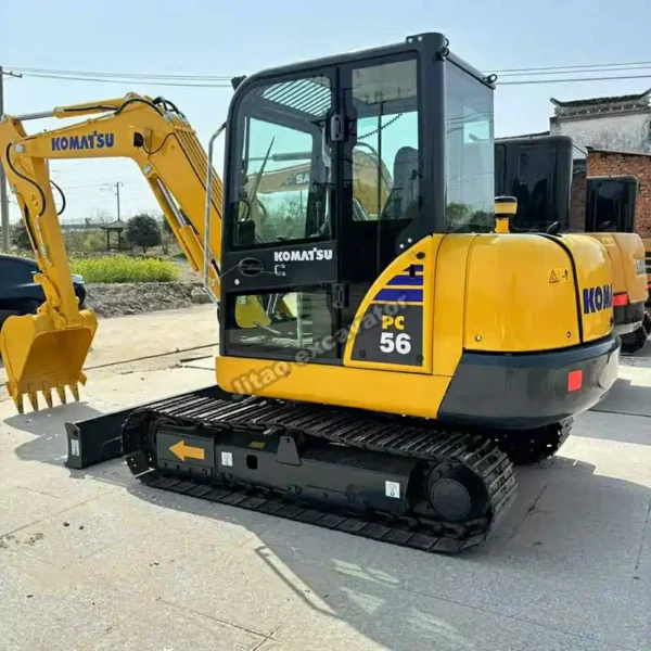 PC56 Front Ready Frontal view of the Komatsu PC56 cabin for buyers of used mini excavators near me.