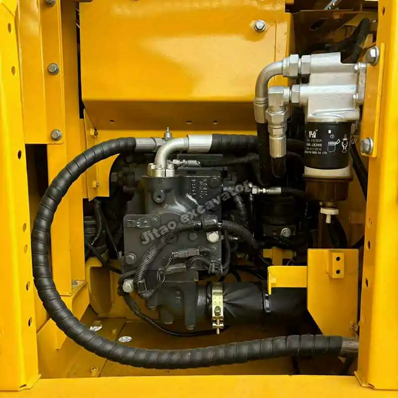 Main hydraulic pump of Komatsu PC130, ensuring a reliable used mini excavator for sale near me.