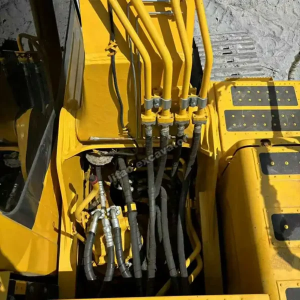PC210 Hydraulic System Close-up of Komatsu PC210 hydraulic valves, ready as a high-tier used small excavator alternative.