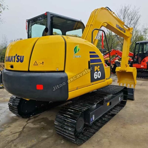 PC60 Rear Profile Rear view showing the counterweight and PC60 decal on an original Komatsu machine.