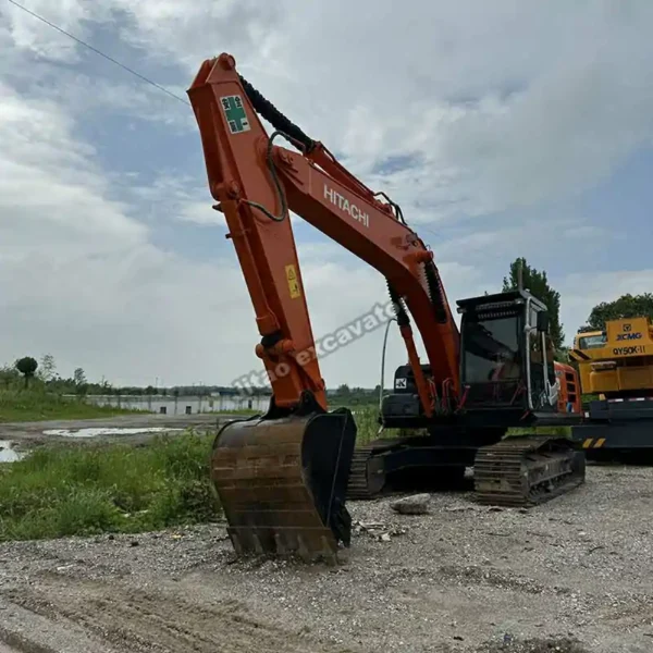 Hitachi ZX210 Perspective High-quality inventory at our hitachi excavator dealer yard.