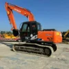 Reliable used compact excavators in the Jitao yard.