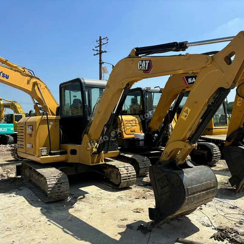 Three-quarter view of certified used excavators CAT 306E2 model.