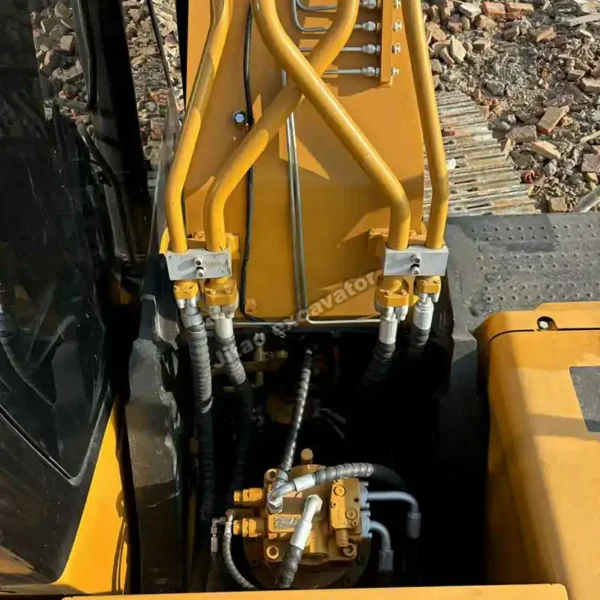 Advanced Hydraulic System Detailed view of the hydraulic system and lines, the core of these used excavator parts.