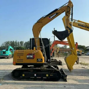 Side view of a Sany SY75, a premium model among our used mini excavators for sale.
