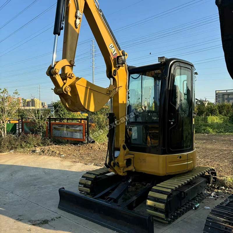 High-quality used CAT 303.5E mini excavator for sale with standard bucket and blade.