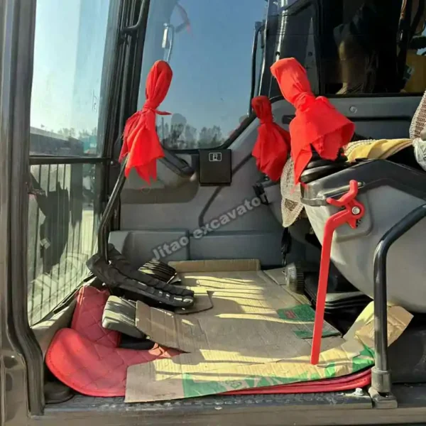 Interior cabin of Volvo EC140 showing well-maintained electronic excavator used parts.