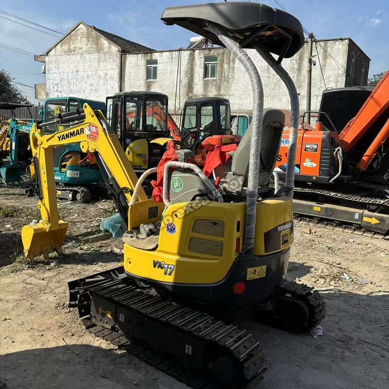 Front profile of a Yanmar 1.7 ton machine showing the boom and bucket.